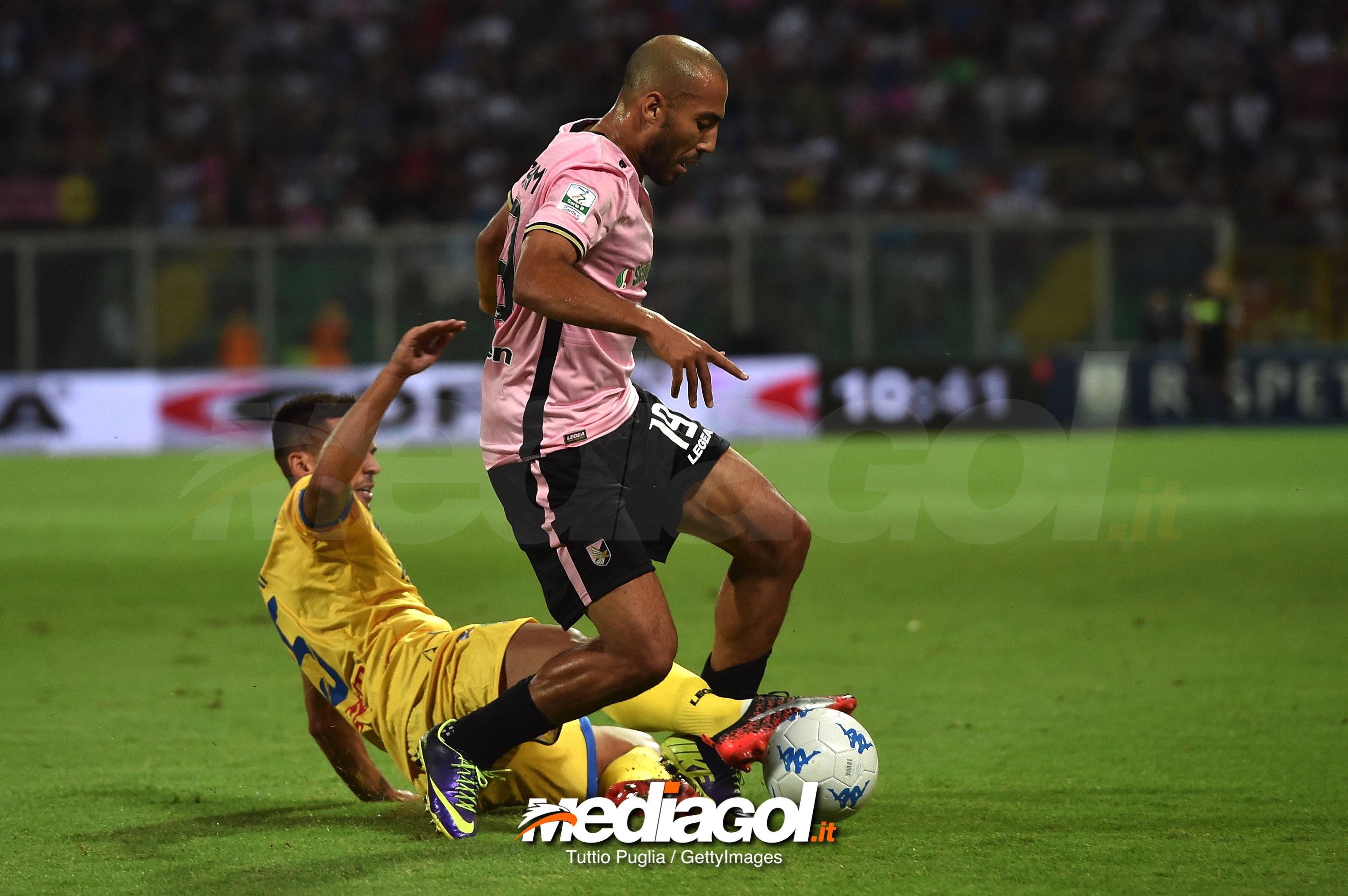 PALERMO, ITALY - JUNE 13: Haitam Aleesami (R) of Palermo in action as  Mirko Gori of Frosinone Tackles during the serie B playoff match final between US Citta di Palermo and Frosinone Calcio at Stadio Renzo Barbera on June 13, 2018 in Palermo, Italy.  (Photo by Tullio M. Puglia/Getty Images)