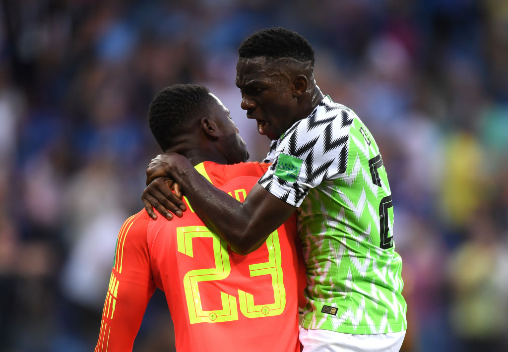 VOLGOGRAD, RUSSIA - JUNE 22:  Francis Uzoho of Nigeria celebrates with team mate Kenneth Omeruo after Gylfi Sigurdsson of Iceland missed the penalty during the 2018 FIFA World Cup Russia group D match between Nigeria and Iceland at Volgograd Arena on June 22, 2018 in Volgograd, Russia.  (Photo by Shaun Botterill/Getty Images)