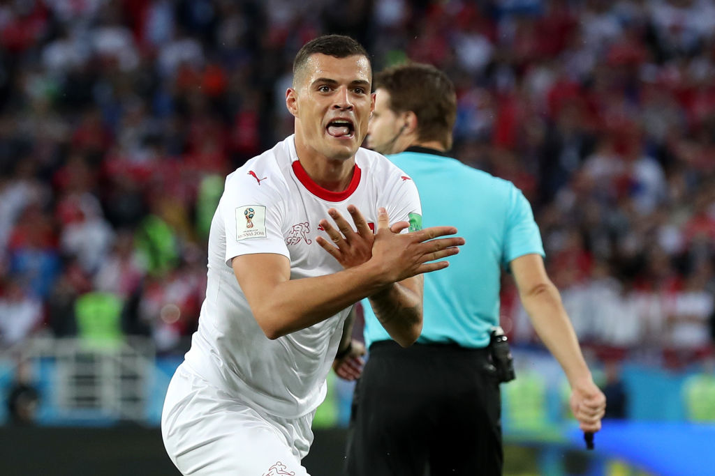 KALININGRAD, RUSSIA - JUNE 22:  Granit Xhaka of Switzerland celebrates after scoring his team's first goal during the 2018 FIFA World Cup Russia group E match between Serbia and Switzerland at Kaliningrad Stadium on June 22, 2018 in Kaliningrad, Russia.  (Photo by Clive Rose/Getty Images)