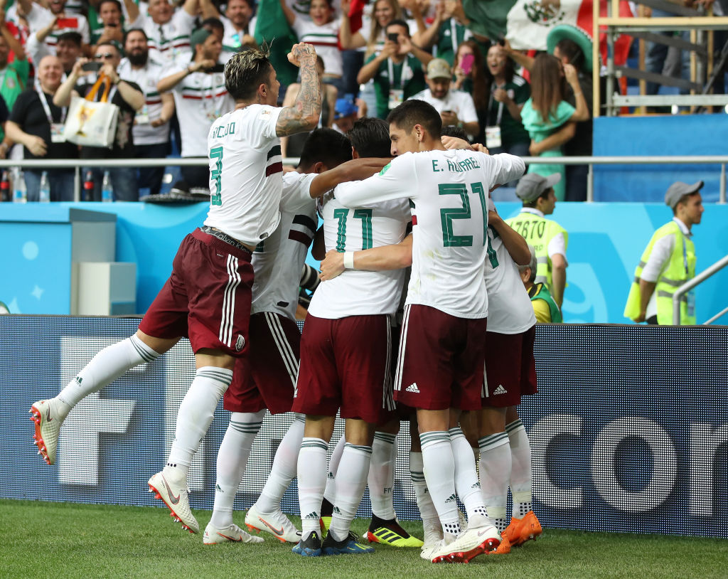 ROSTOV-ON-DON, RUSSIA - JUNE 23:  Javier Hernandez of Mexico celebrates with teammates after scoring his team's second goal during the 2018 FIFA World Cup Russia group F match between Korea Republic and Mexico at Rostov Arena on June 23, 2018 in Rostov-on-Don, Russia.  (Photo by Clive Mason/Getty Images)