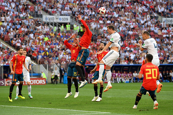 MOSCOW, RUSSIA - JULY 01:  Gerard Pique of Spain handles the ball inside the penalty area, leading to a penalty awarded to Russia during the 2018 FIFA World Cup Russia Round of 16 match between Spain and Russia at Luzhniki Stadium on July 1, 2018 in Moscow, Russia.  (Photo by Matthias Hangst/Getty Images)