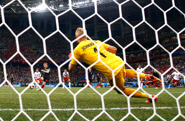 NIZHNY NOVGOROD, RUSSIA - JULY 01:  Kasper Schmeichel of Denmark saves a penalty from Luka Modric of Croatia during the 2018 FIFA World Cup Russia Round of 16 match between Croatia and Denmark at Nizhny Novgorod Stadium on July 1, 2018 in Nizhny Novgorod, Russia.  (Photo by Julian Finney/Getty Images)