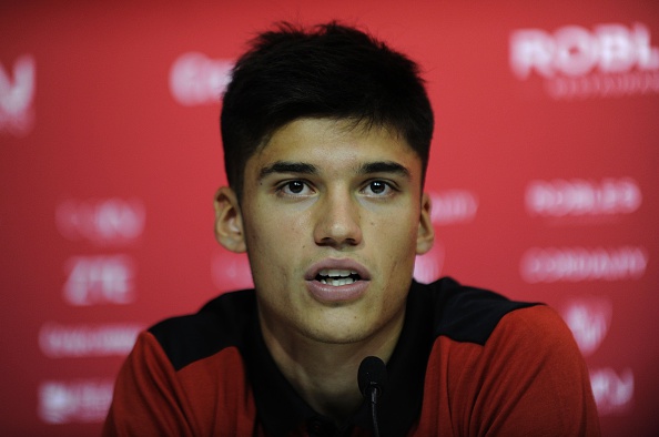 New Sevilla's Argentinian midfielder Joaquin Correa speaks during a press conference held for his official presentation at the Ramon Sanchez Pizjuan stadium in Sevilla on July 12, 2016. 

 / AFP / CRISTINA QUICLER        (Photo credit should read CRISTINA QUICLER/AFP/Getty Images)
