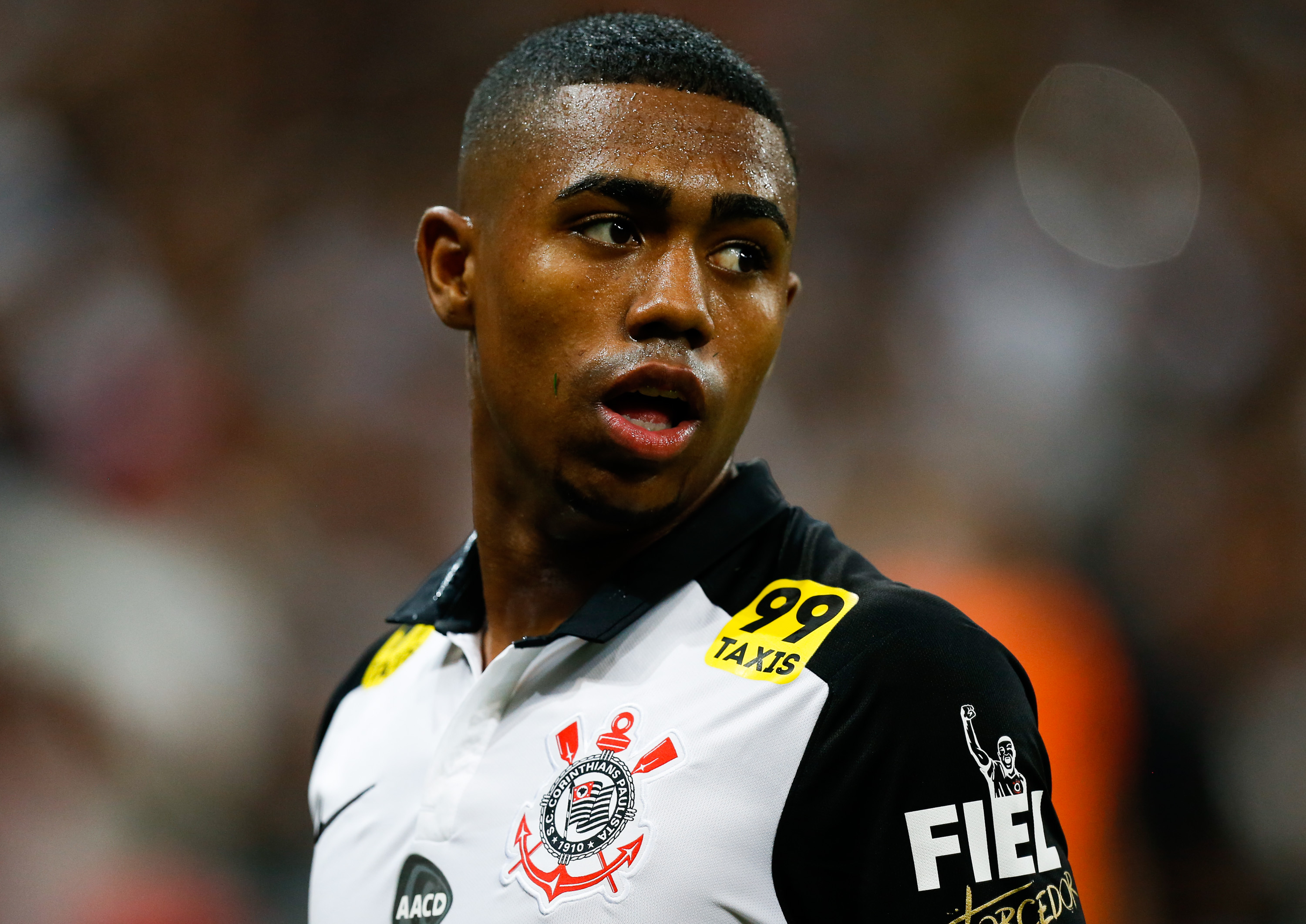 SAO PAULO, BRAZIL - OCTOBER 15: Malcom of Corinthians in action during the match between Corinthians and Goias for the Brazilian Series A 2015 at Arena Corinthians stadium on October 15, 2015 in Sao Paulo, Brazil. (Photo by Alexandre Schneider/Getty Images)