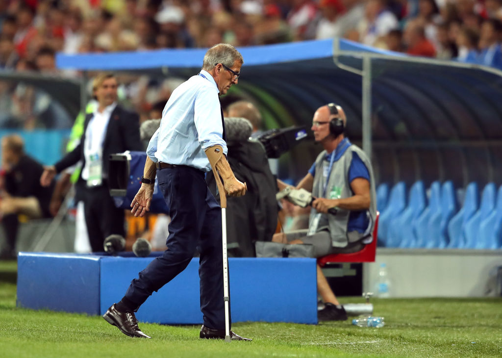 SOCHI, RUSSIA - JUNE 30:  Oscar Tabarez, Head coach of Uruguay gets back on the bench during the 2018 FIFA World Cup Russia Round of 16 match between Uruguay and Portugal at Fisht Stadium on June 30, 2018 in Sochi, Russia.  (Photo by Richard Heathcote/Getty Images)