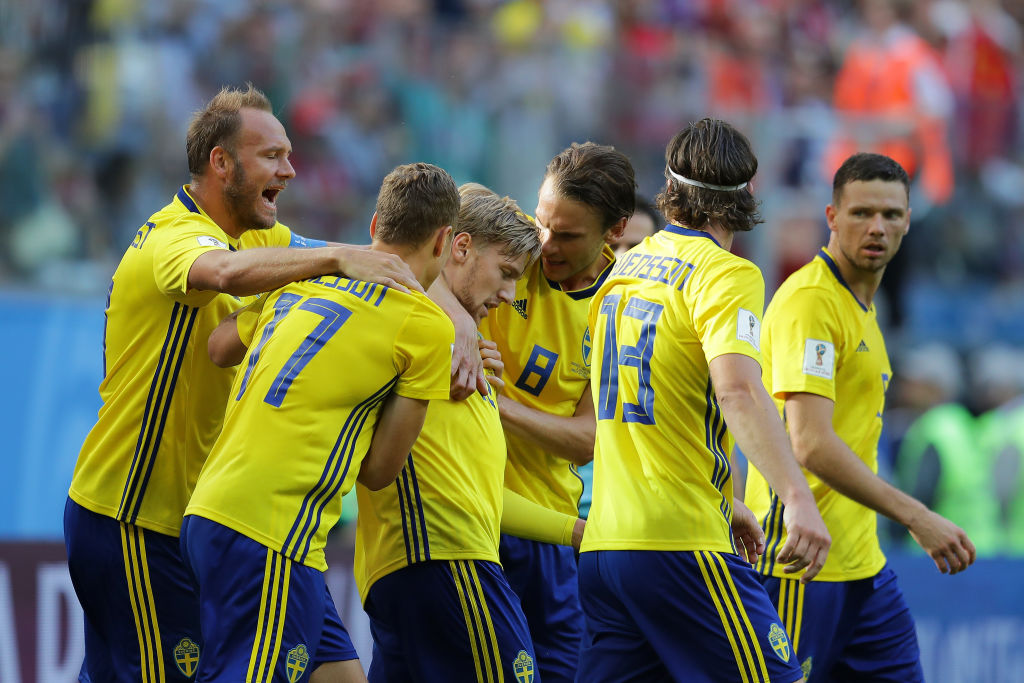 SAINT PETERSBURG, RUSSIA - JULY 03:  Emil Forsberg of Sweden celebrates with teammates after scoring his team's first goal during the 2018 FIFA World Cup Russia Round of 16 match between Sweden and Switzerland at Saint Petersburg Stadium on July 3, 2018 in Saint Petersburg, Russia.  (Photo by Richard Heathcote/Getty Images)