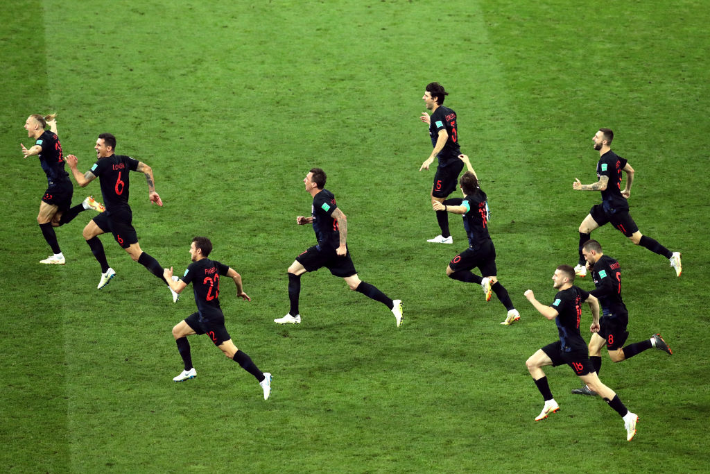 SOCHI, RUSSIA - JULY 07:  Croatia players celebrate winning the penalty shoot out during the 2018 FIFA World Cup Russia Quarter Final match between Russia and Croatia at Fisht Stadium on July 7, 2018 in Sochi, Russia.  (Photo by Catherine Ivill/Getty Images)