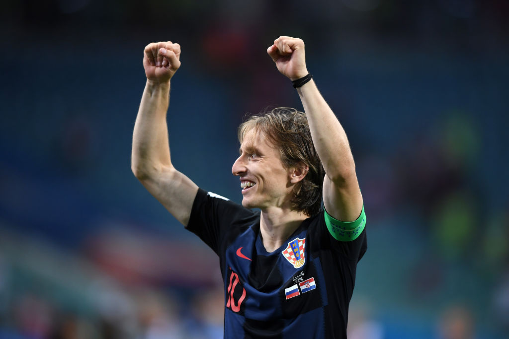 SOCHI, RUSSIA - JULY 07:  Luka Modric of Croatia celebrates following his sides victory in the 2018 FIFA World Cup Russia Quarter Final match between Russia and Croatia at Fisht Stadium on July 7, 2018 in Sochi, Russia.  (Photo by Shaun Botterill/Getty Images)