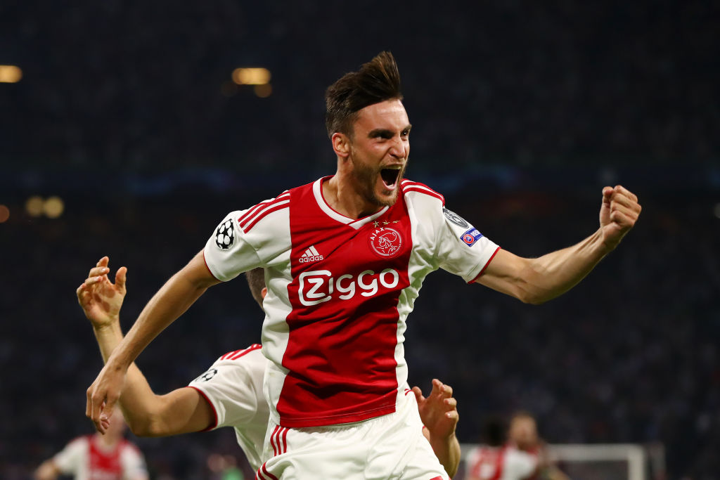 AMSTERDAM, NETHERLANDS - SEPTEMBER 19:  Nicolas Tagliafico of Ajax celebrates after scoring his team's first goal during the Group E match of the UEFA Champions League between Ajax and AEK Athens at Johan Cruyff Arena on September 19, 2018 in Amsterdam, Netherlands.  (Photo by Dean Mouhtaropoulos/Getty Images)