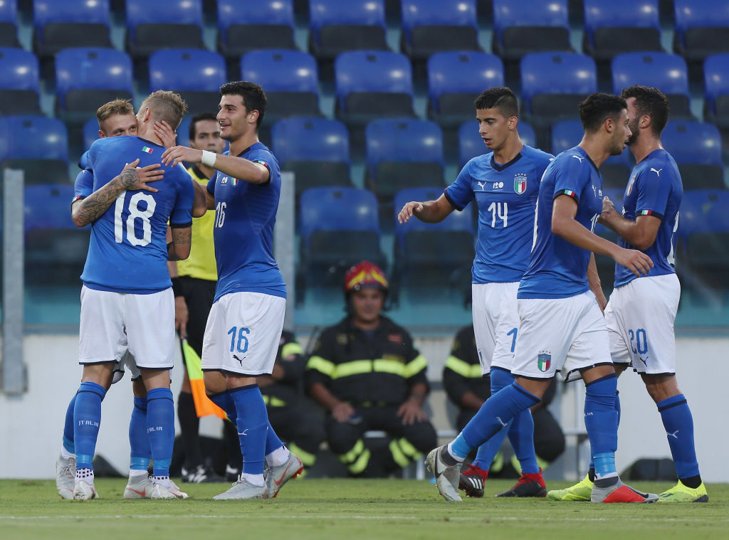CAGLIARI, ITALY - SEPTEMBER 11:  Federico Di Marco with his teammates of Italy U21 celebrates after scoring the opening goal during the International Friendly match between Italy U21 and Albania U21 at Sardegna Arena on September 11, 2018 in Cagliari, Italy.  (Photo by Paolo Bruno/Getty Images)
