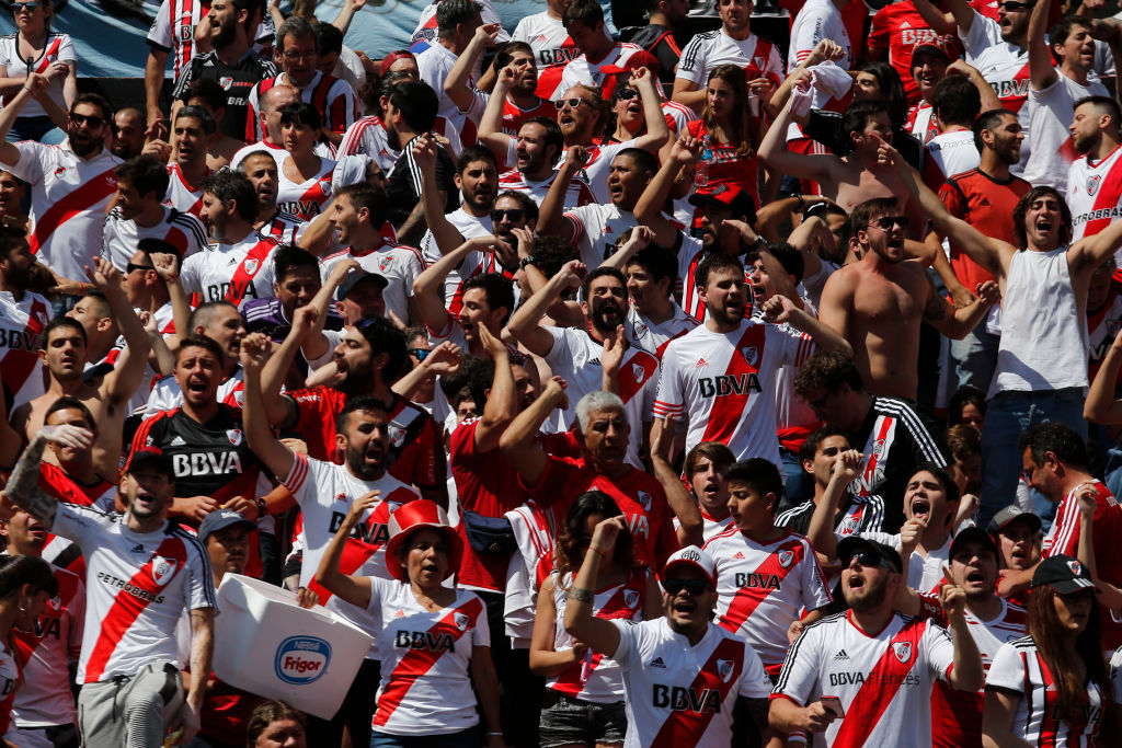 BUENOS AIRES, ARGENTINA - NOVEMBER 24: Fans of River Plate cheer for their team before the second leg final match of Copa CONMEBOL Libertadores 2018 between River Plate and Boca Juniors at Estadio Monumental Antonio Vespucio Liberti on November 24, 2018 in Buenos Aires, Argentina. (Photo by Marcelo Hernandez/Getty Images)