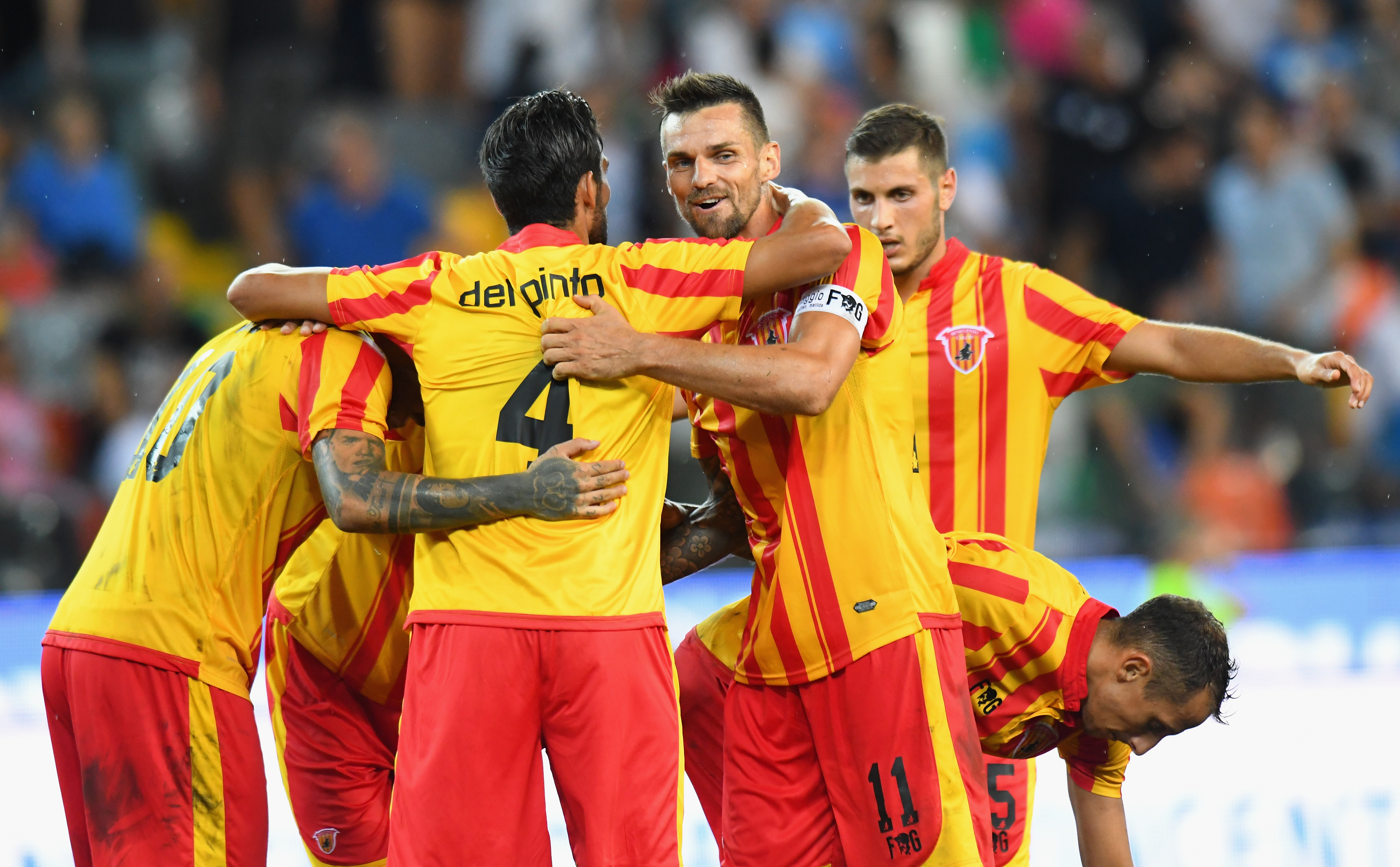 UDINE, ITALY - AUGUST 11: Benevento Calcio players celebrate the victory after the Coppa Italia match between Udinese Calcio and Benevento Calcio at Stadio Friuli on August 11, 2018 in Udine, Italy.  (Photo by Alessandro Sabattini/Getty Images)