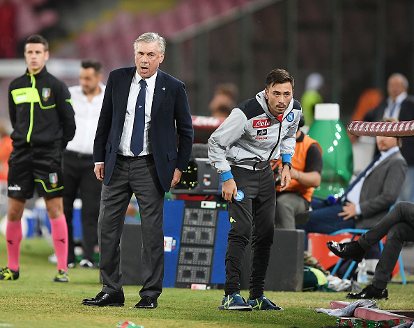 NAPLES, ITALY - OCTOBER 07: Coach of SSC Napoli Carlo Ancelotti with his son Davide Ancelotti member of his staff during the Serie A match between SSC Napoli and US Sassuolo at Stadio San Paolo on October 7, 2018 in Naples, Italy.  (Photo by Francesco Pecoraro/Getty Images)