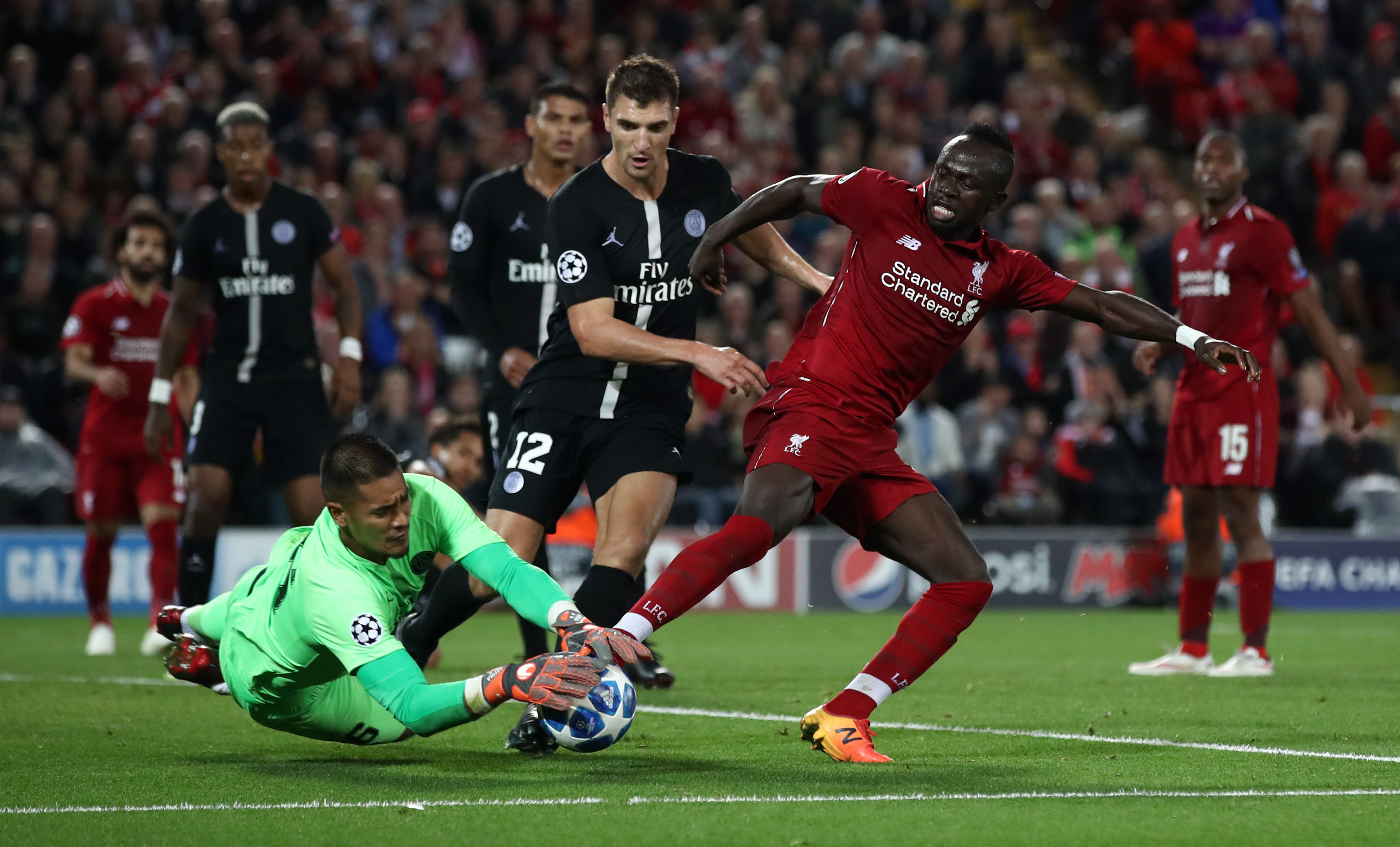 LIVERPOOL, ENGLAND - SEPTEMBER 18:  Alphonse Areola of Paris Saint-Germain collects the ball under pressure from Sadio Mane of Liverpool during the Group C match of the UEFA Champions League between Liverpool and Paris Saint-Germain at Anfield on September 18, 2018 in Liverpool, United Kingdom.  (Photo by Julian Finney/Getty Images)