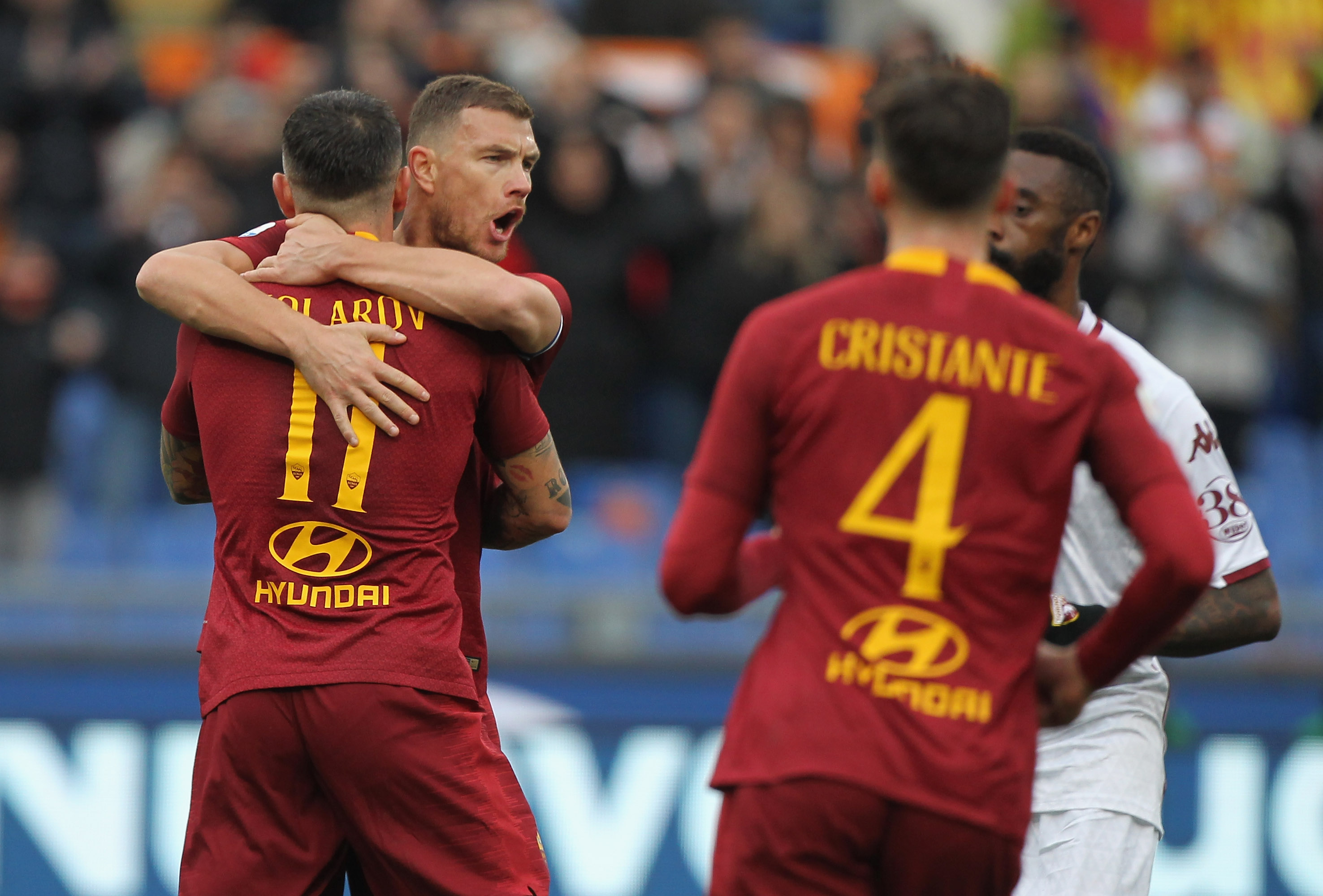 ROME, ITALY - JANUARY 19:  Aleksander Kolarov with his teammate Edin Dzeko of AS Roma celebrates after scoring the team's second goal from penalty spot during the Serie A match between AS Roma and Torino FC at Stadio Olimpico on January 19, 2019 in Rome, Italy.  (Photo by Paolo Bruno/Getty Images)