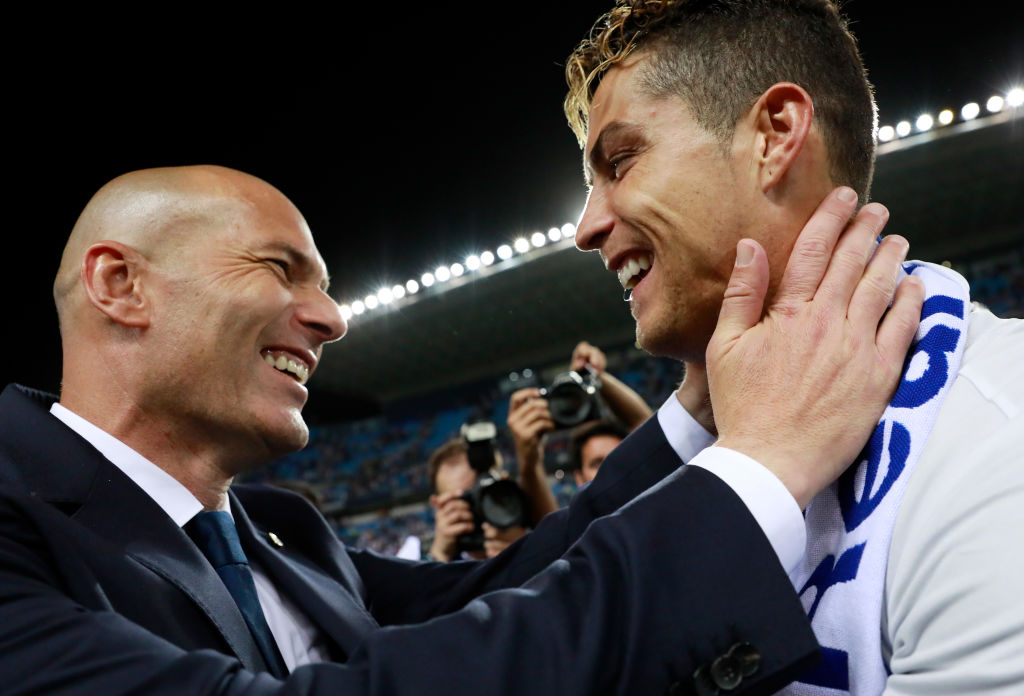 MALAGA, SPAIN - MAY 21:  Zinedine Zidane, Manager of Real Madrid celebrates with Cristiano Ronaldo after being crowned champions following the La Liga match between Malaga and Real Madrid at La Rosaleda Stadium on May 21, 2017 in Malaga, Spain.  (Photo by Gonzalo Arroyo Moreno/Getty Images)