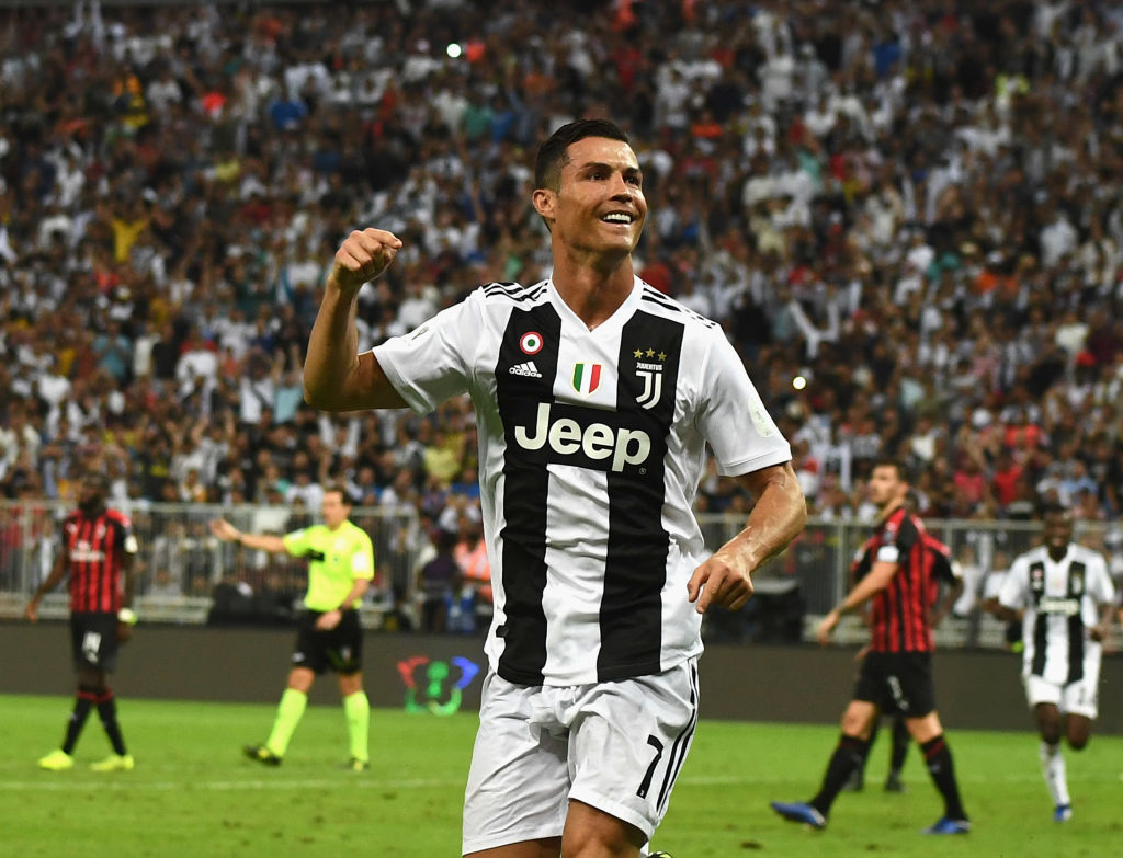 JEDDAH, SAUDI ARABIA - JANUARY 16: Cristiano Ronaldo of Juventus celebrates after scoring his sides first goal during the Italian Supercup match between Juventus and AC Milan at King Abdullah Sports City on January 16, 2019 in Jeddah, Saudi Arabia. (Photo by Claudio Villa/Getty Images for Lega Serie A)