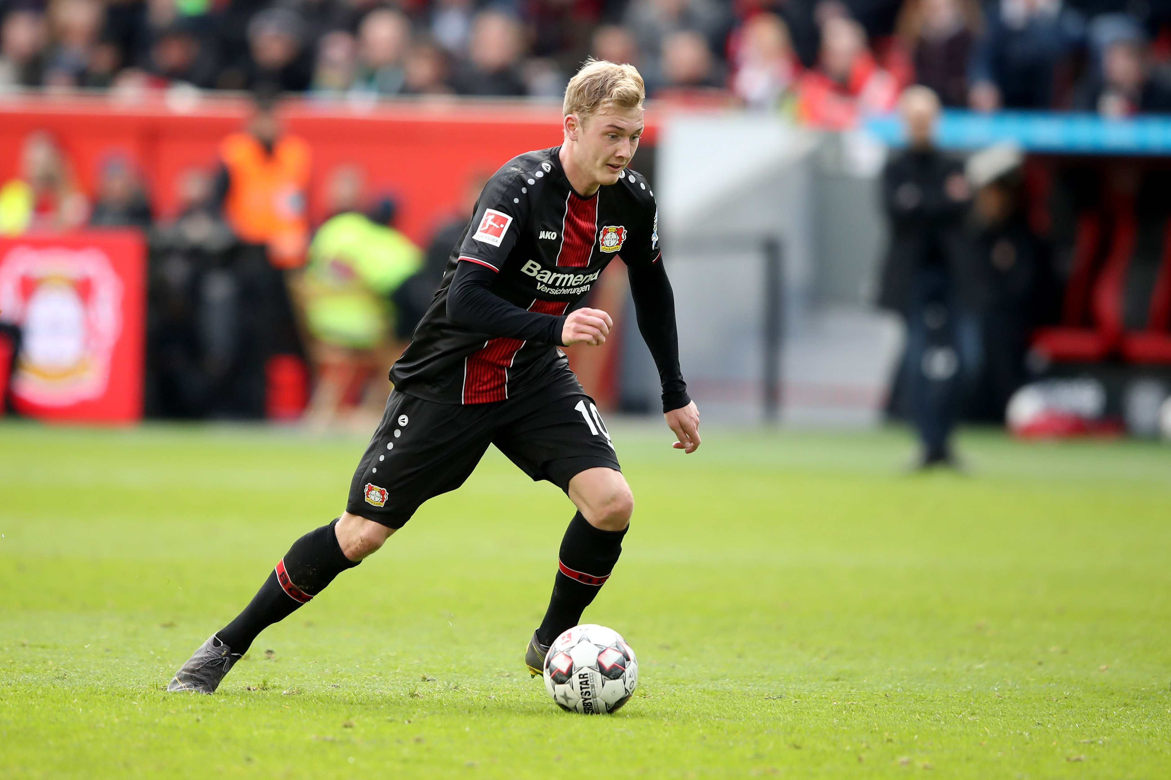 LEVERKUSEN, GERMANY - MARCH 17: Julian Brandt of Leverkusen runs with the ball during the Bundesliga match between Bayer 04 Leverkusen and SV Werder Bremen at BayArena on March 17, 2019 in Leverkusen, Germany. (Photo by Christof Koepsel/Bongarts/Getty Images)