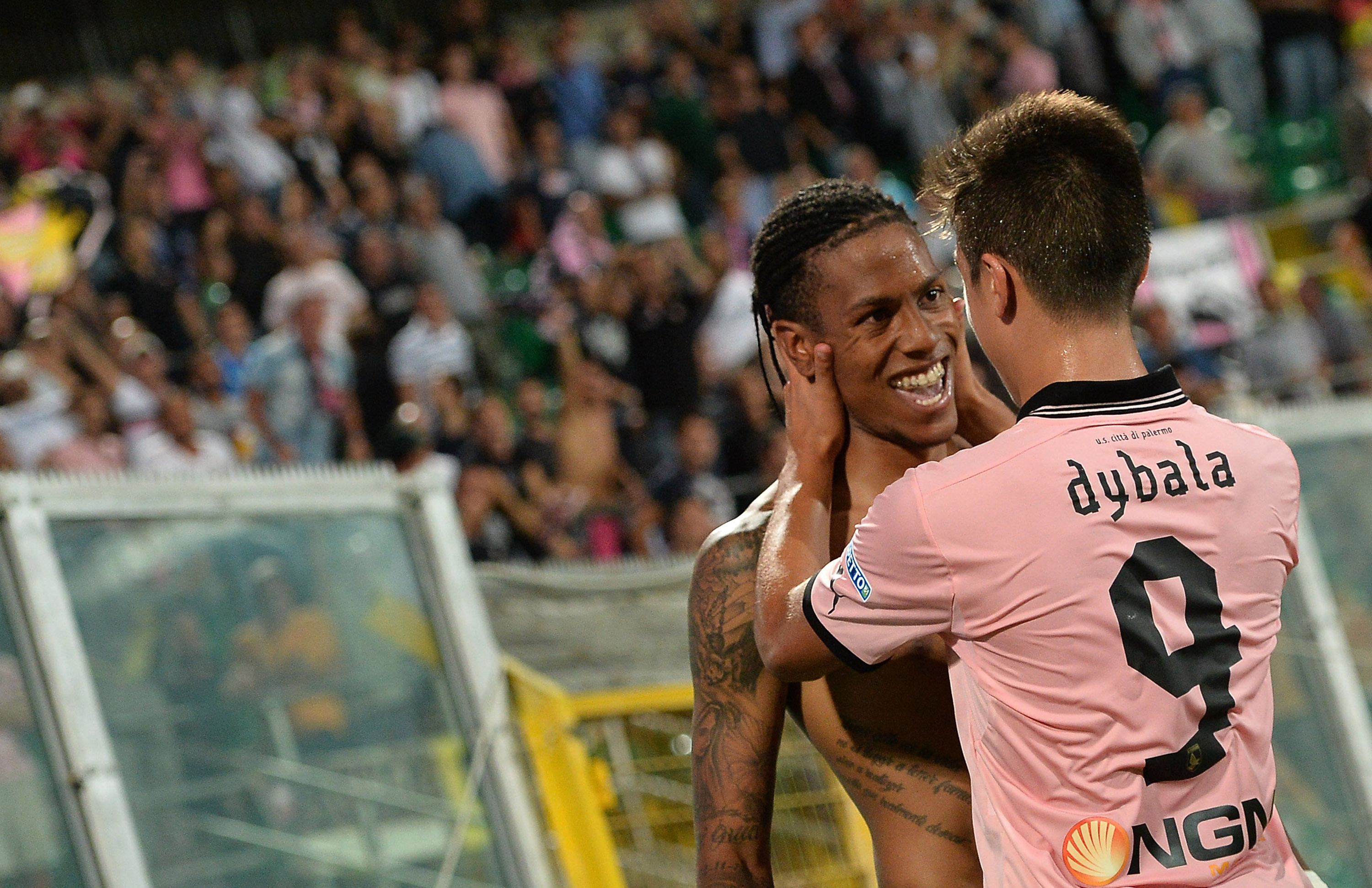 PALERMO, ITALY - SEPTEMBER 13:  Abel Hernandez (L) of Palermo celebrates with Paulo Dybala after scoring his team's second goal during the Serie B match between US Citta di Palermo and AC Cesena at Stadio Renzo Barbera on September 13, 2013 in Palermo, Italy.  (Photo by Tullio M. Puglia/Getty Images)