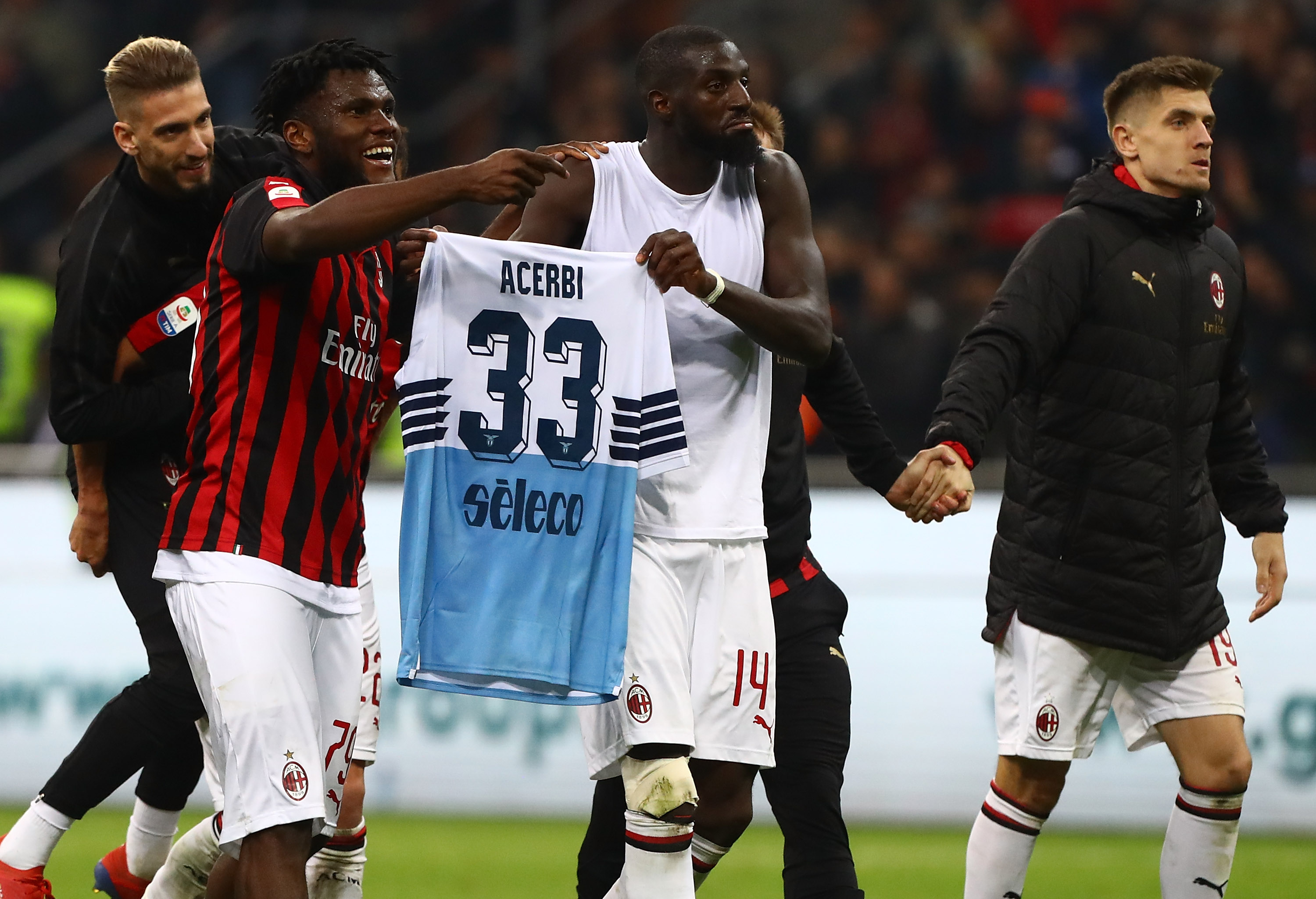 MILAN, ITALY - APRIL 13:  (L-R) Samuel Castillejo, Franck Kessie, Tiemoue Bakayoko and Krzysztof Piatek of AC Milan celebrate a victory at the end of the Serie A match between AC Milan and SS Lazio at Stadio Giuseppe Meazza on April 13, 2019 in Milan, Italy.  (Photo by Marco Luzzani/Getty Images)