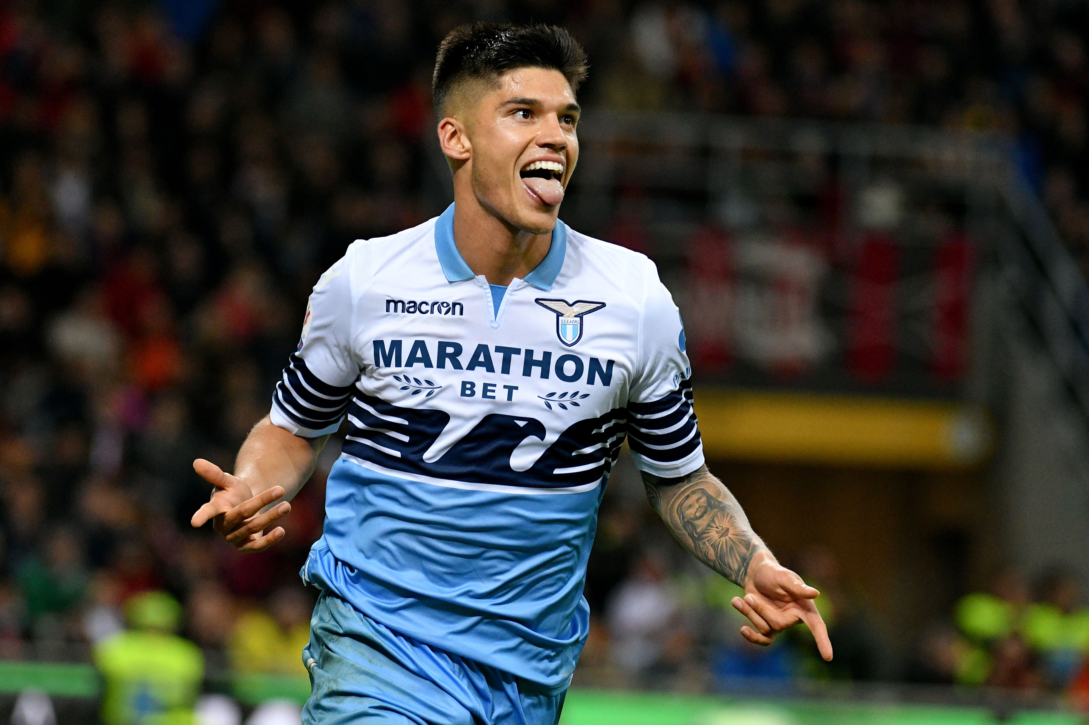 MILAN, ITALY - APRIL 24:  Joaquin Correa of SS Lazio celebrates the opening goal with his team mates during the TIM Cup match between AC Milan and SS Lazio at Stadio Giuseppe Meazza on April 24, 2019 in Milan, Italy.  (Photo by Marco Rosi/Getty Images)