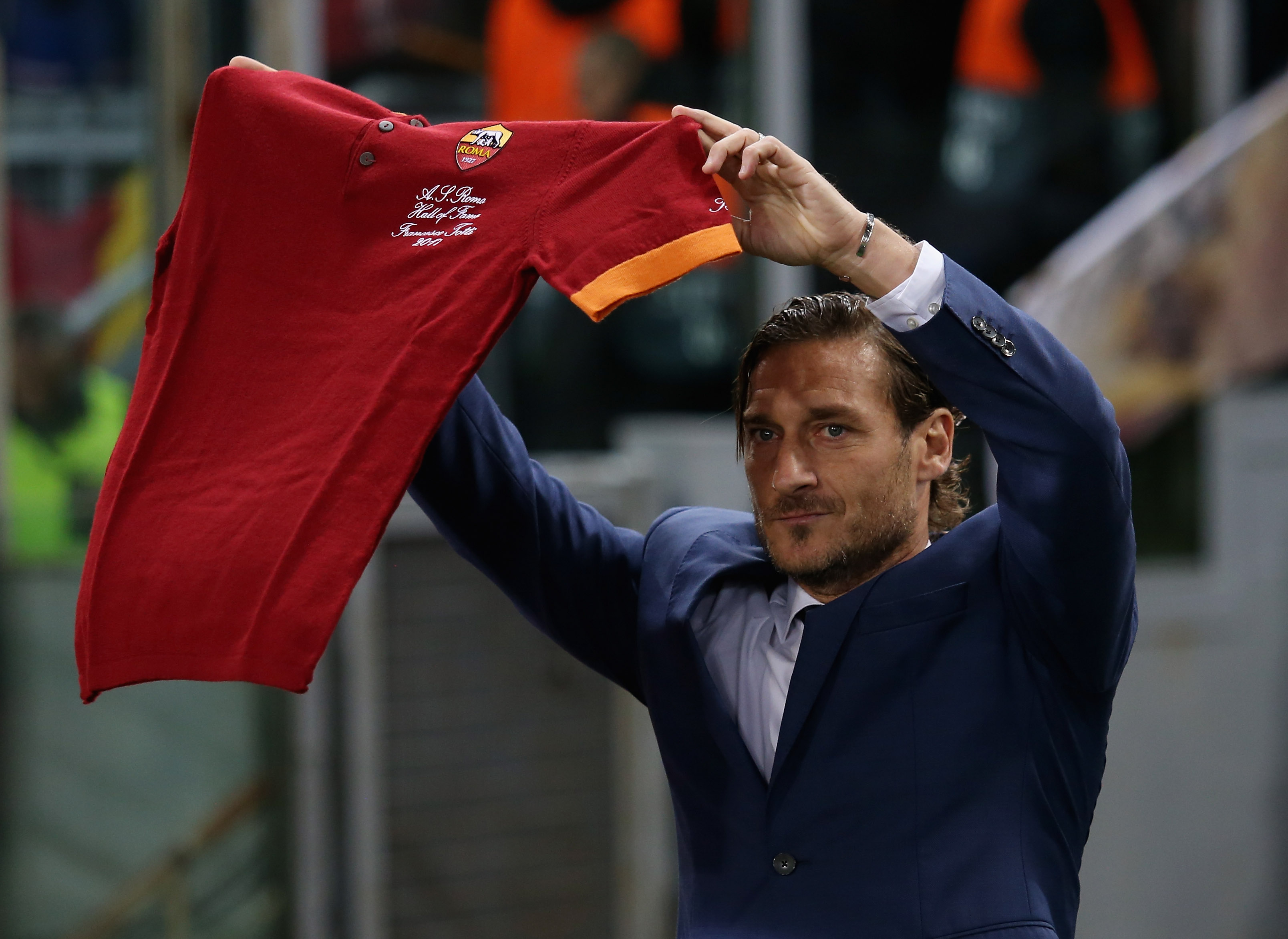 ROME, ITALY - NOVEMBER 27:  AS Roma former player Francesco Totti holds the Hall of Fame jersey before the group G match of the UEFA Champions League between AS Roma and Real Madrid at Stadio Olimpico on November 27, 2018 in Rome, Italy.  (Photo by Paolo Bruno/Getty Images)