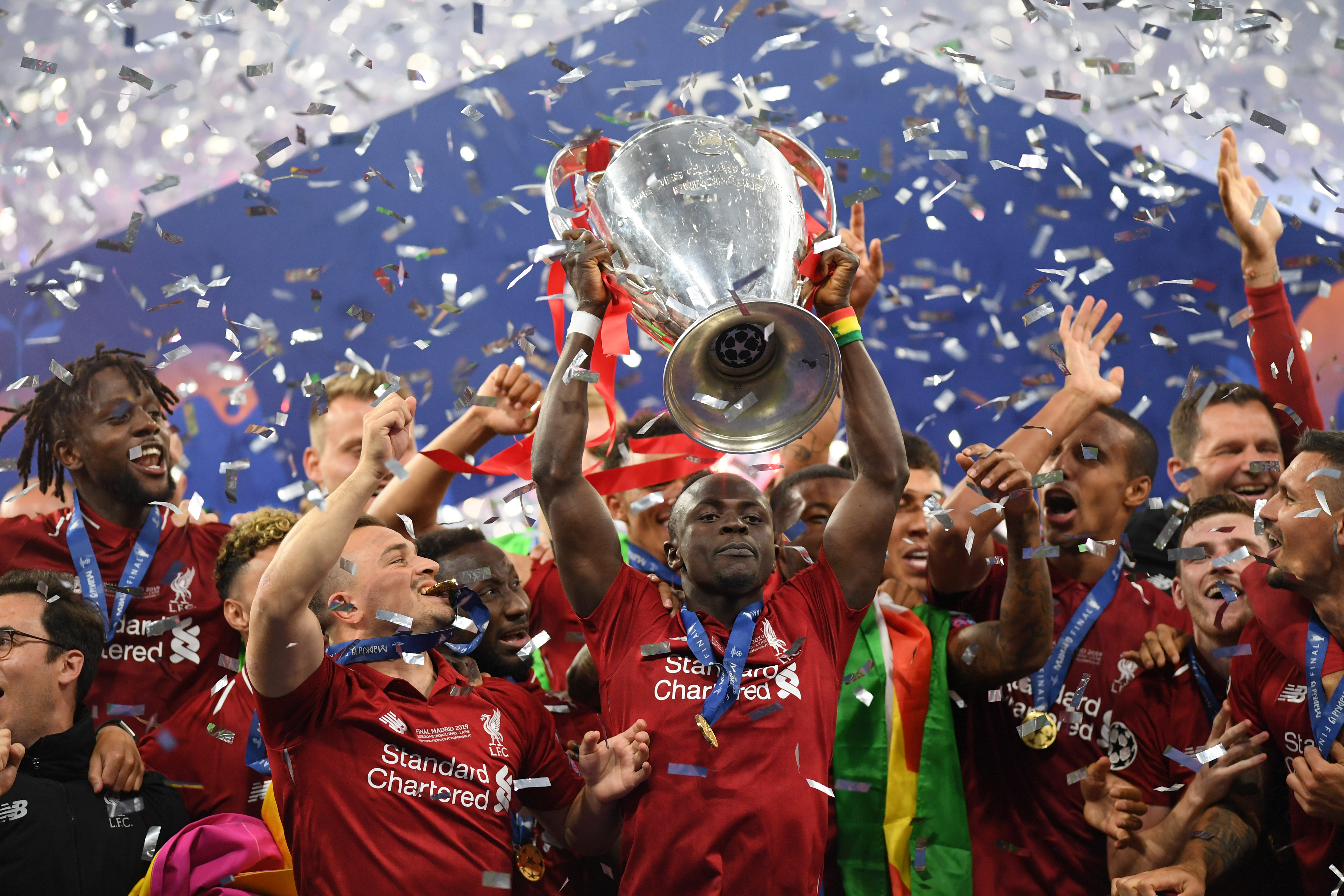 MADRID, SPAIN - JUNE 01: Sadio Mane of Liverpool celebrates with the Champions League Trophy after winning the UEFA Champions League Final between Tottenham Hotspur and Liverpool at Estadio Wanda Metropolitano on June 01, 2019 in Madrid, Spain. (Photo by Matthias Hangst/Getty Images)