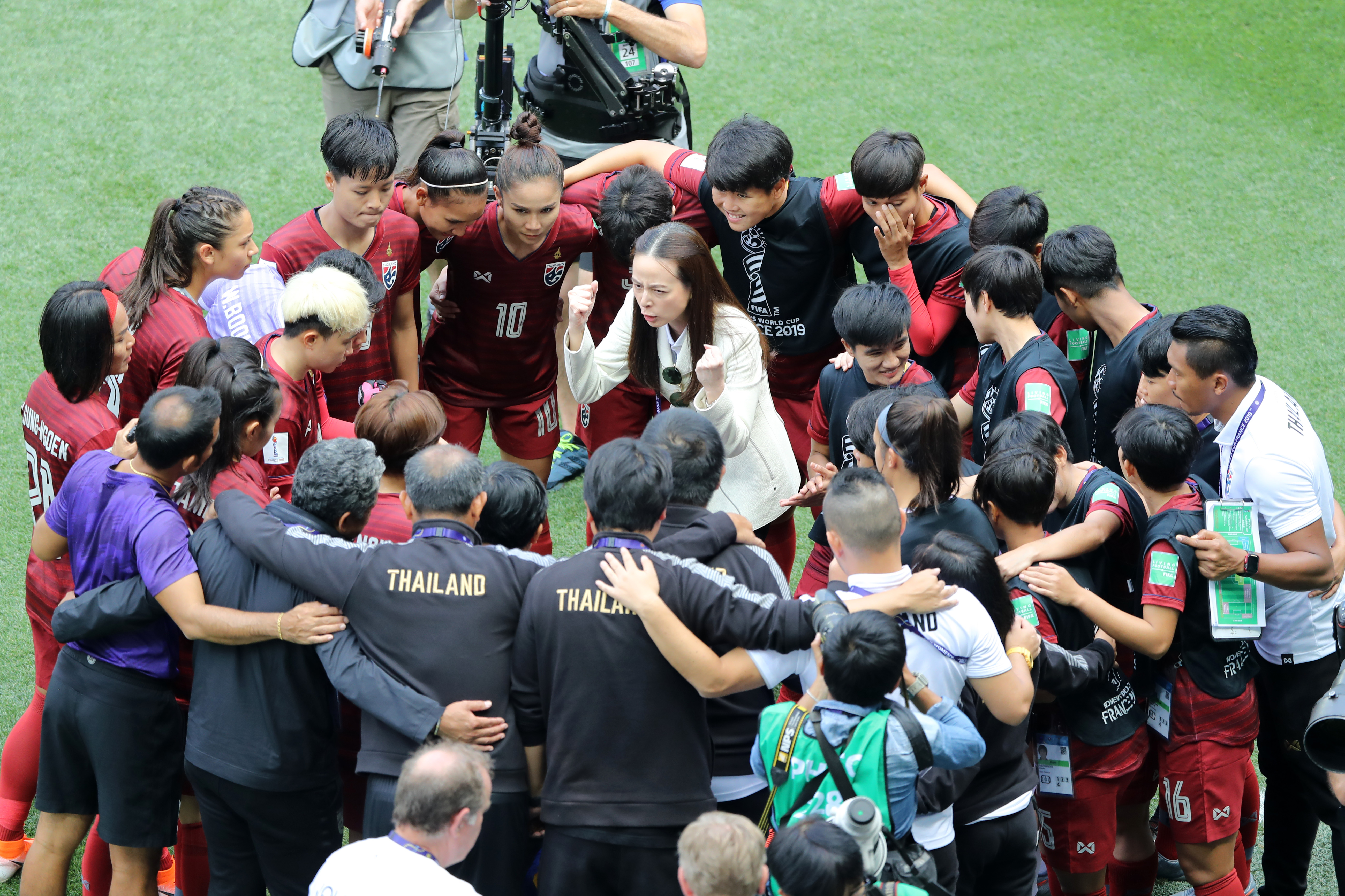 NICE, FRANCE - JUNE 16: The Thailand players and staff form a team huddle prior to the 2019 FIFA Women's World Cup France group F match between Sweden and Thailand at Stade de Nice on June 16, 2019 in Nice, France. (Photo by Elsa/Getty Images)