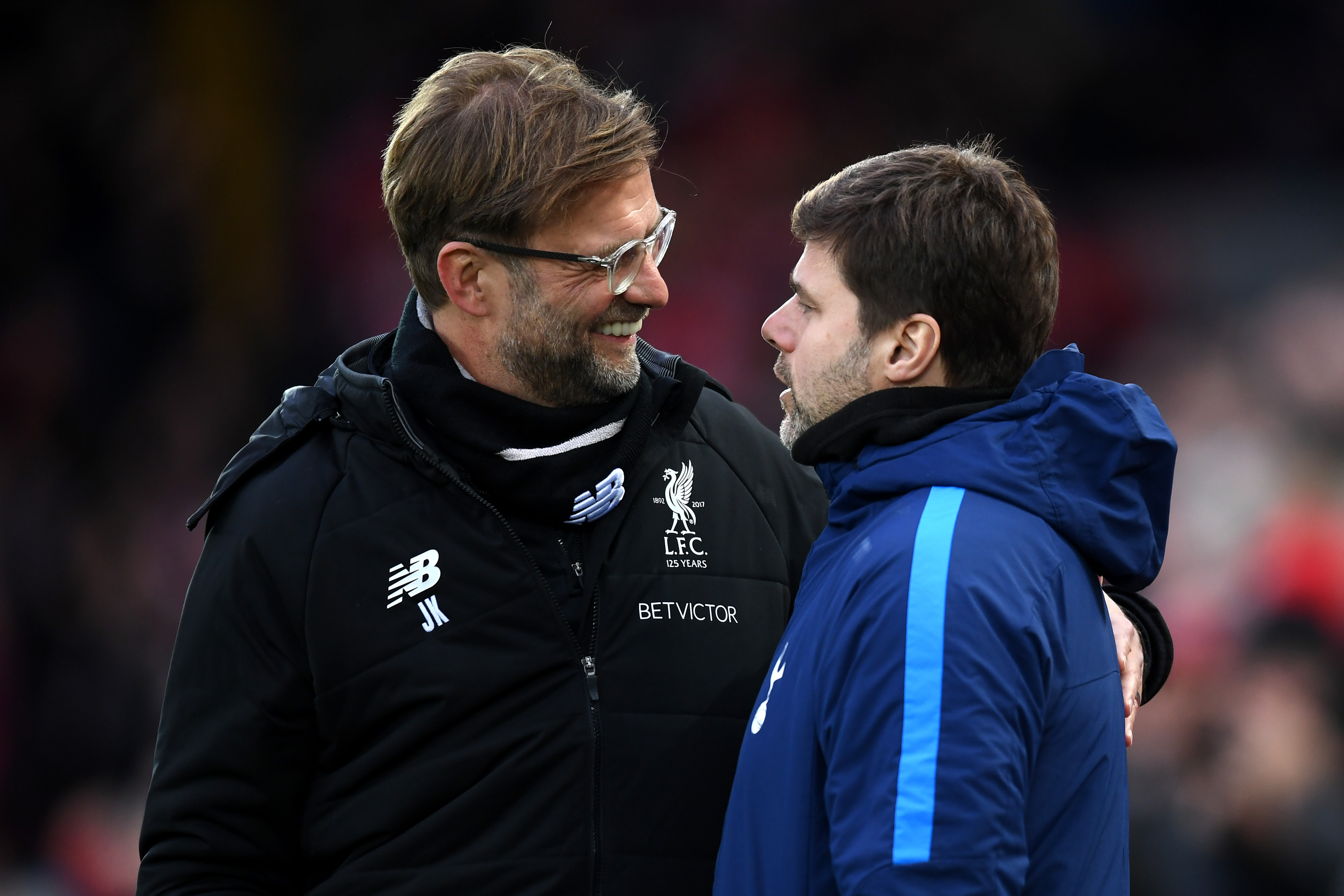 LIVERPOOL, ENGLAND - FEBRUARY 04:  Jurgen Klopp, Manager of Liverpool greets Mauricio Pochettino, Manager of Tottenham Hotspur prior to the Premier League match between Liverpool and Tottenham Hotspur at Anfield on February 4, 2018 in Liverpool, England.  (Photo by Michael Regan/Getty Images)