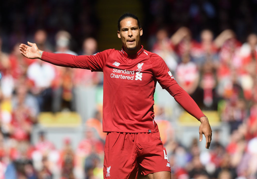 LIVERPOOL, ENGLAND - MAY 13:  Virgil van Dijk  of Liverpool in action during the Premier League match between Liverpool and Brighton and Hove Albion at Anfield on May 13, 2018 in Liverpool, England.  (Photo by Michael Regan/Getty Images)